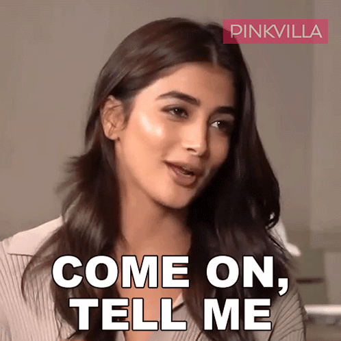 A Woman Says Come On Tell Me With A Pinkvilla Logo Behind Her GIF