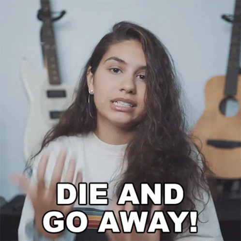 A Woman Says " Die And Go Away " In Front Of A Guitar GIF