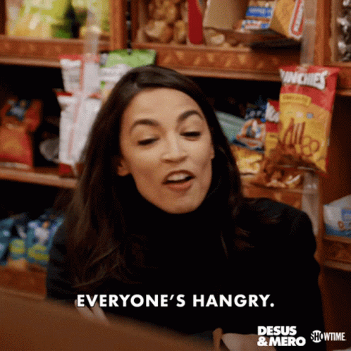 A Woman Says Everyone 'S Hangry In Front Of Chips GIF