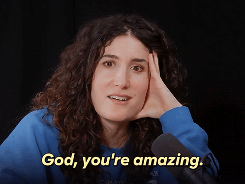 A Woman Says God You 'Re Amazing While Holding Her Head GIF