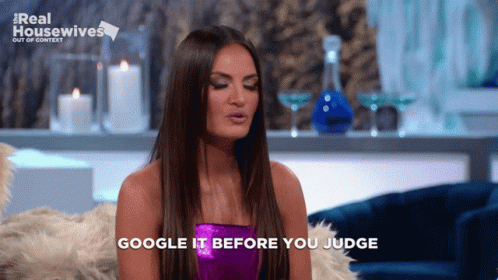 A Woman Says Google It Before You Judge While Sitting On A Couch GIF