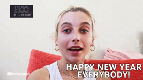 A Woman Says Happy New Year Everybody In A Video GIF