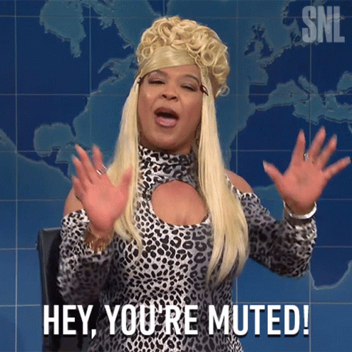a woman says hey you 're muted in front of a map
