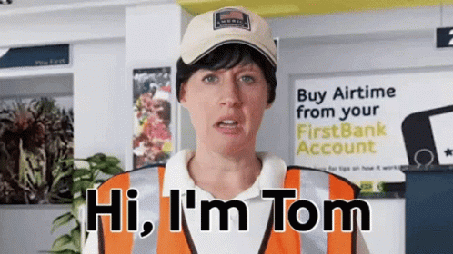A Woman Says Hi I 'M Tom In Front Of A Sign That Says Buy Airtime From Your First Bank Account GIF