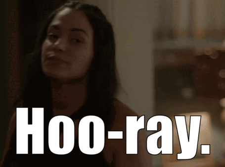 A Woman Says Hoo-Ray While Looking At Something GIF