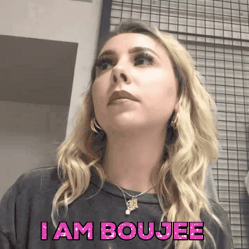 A Woman Says I Am Boujee In Pink GIF