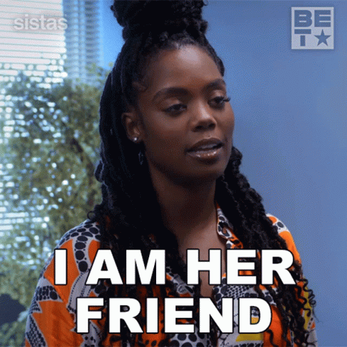 A Woman Says " I Am Her Friend " While Wearing An Orange Shirt GIF