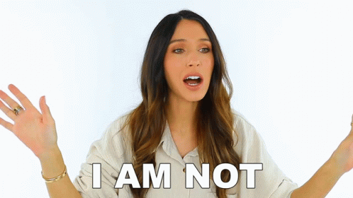 Woman Saying I Am Not With Arms Up GIF