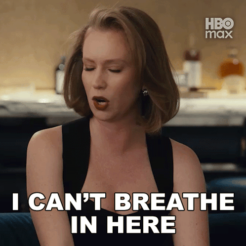 A Woman Says " I Can 'T Breathe In Here " In Front Of A Hbo Max Logo GIF