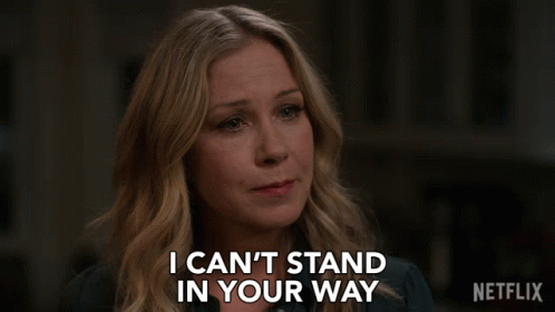 A Woman Says I Can 'T Stand In Your Way In Front Of A Netflix Logo GIF