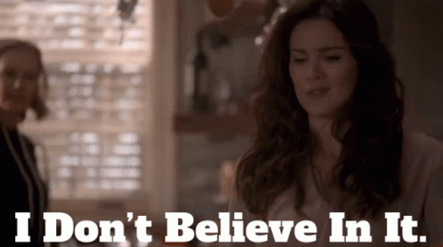A Woman Says " I Don 'T Believe In It " While Another Woman Looks On GIF