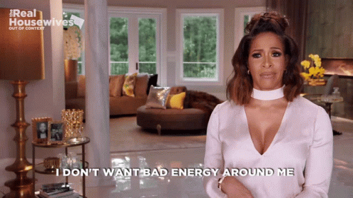 A Woman Says I Don T Want Bad Energy Around Me In Front Of A Living Room GIF