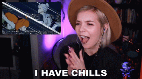 A Woman Says I Have Chills In Front Of A Picture GIF