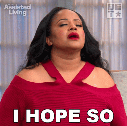 A Woman Says I Hope So While Wearing A Red Dress GIF