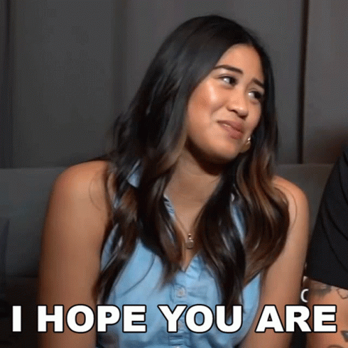 A Woman Says I Hope You Are While Looking At The Camera GIF