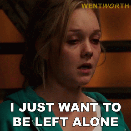 A Woman Says " I Just Want To Be Left Alone " In Front Of A Sign That Says Wentworth GIF