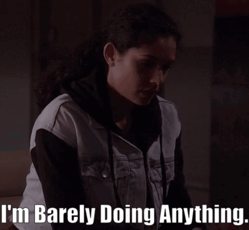 A Woman Says I 'M Barely Doing Anything In A Dark Room GIF