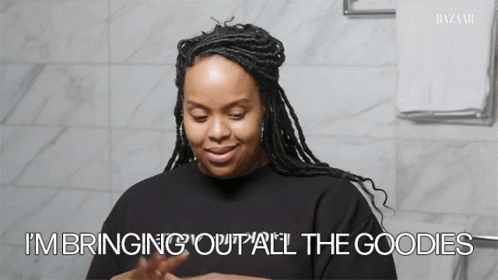 A Woman Says " I 'M Bringing Out All The Goodies " GIF
