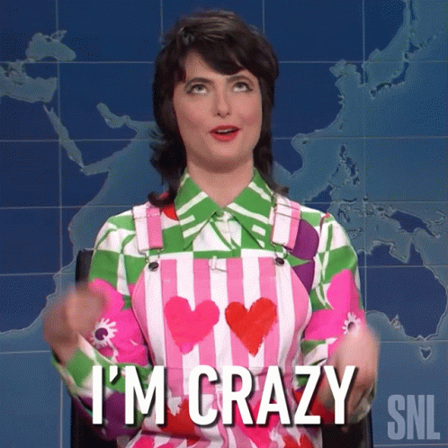 A Woman Says I 'M Crazy In Front Of A World Map GIF