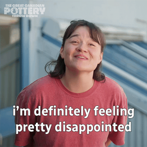 A Woman Says " I 'M Definitely Feeling Pretty Disappointed " In A Red Shirt GIF