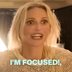 A Woman Says I 'M Focused While Making A Funny Face GIF