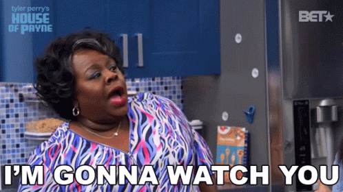 A Woman Says " I 'M Gonna Watch You " In A Kitchen GIF