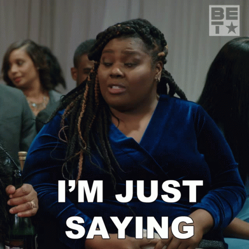 A Woman Says I 'M Just Saying In A Blue Dress GIF