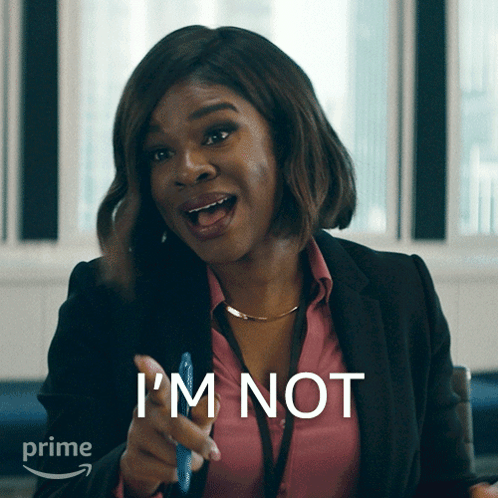 A Woman Says I 'M Not While Pointing At Something GIF