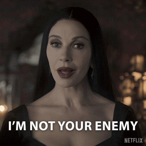 A Woman Says I 'M Not Your Enemy In A Netflix Advertisement GIF