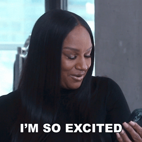 A Woman Says I 'M So Excited While Holding Her Phone GIF