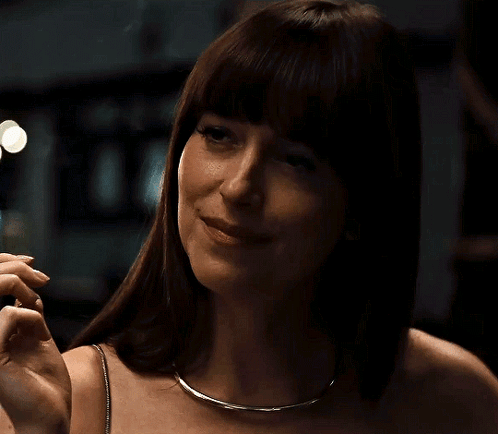 a woman says " i missed you " while holding something in her hand