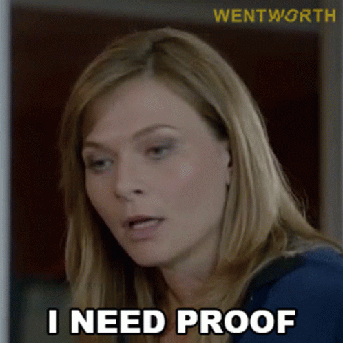 A Woman Says " I Need Proof " In Front Of A Watermark For Wentworth GIF
