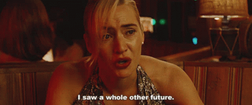 A Woman Says " I Saw A Whole Other Future " In A Dark Room GIF