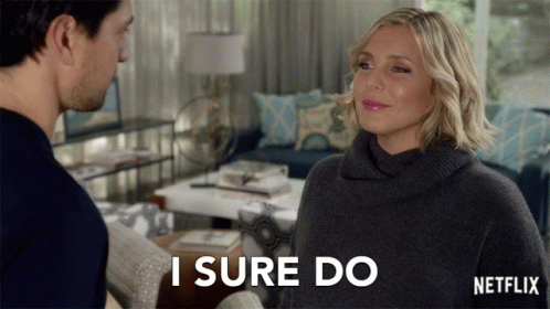 A Woman Says I Sure Do In Front Of A Netflix Logo GIF