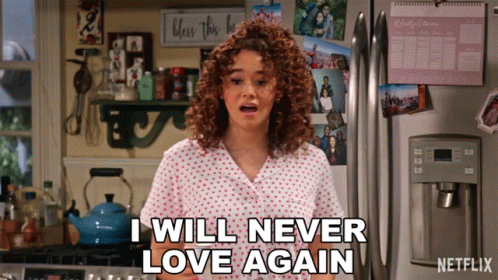 A Woman Says I Will Never Love Again In Front Of A Fridge GIF