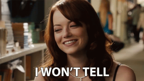 A Woman Says I Won 'T Tell In A Hallway GIF