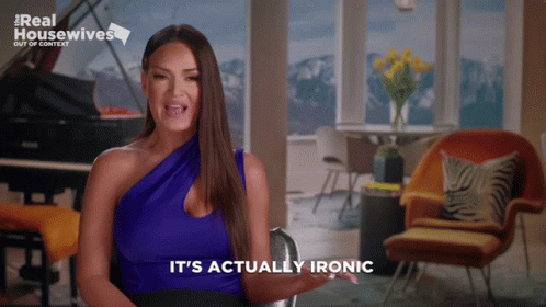 A Woman Says It 'S Actually Ironic In Front Of A Piano GIF