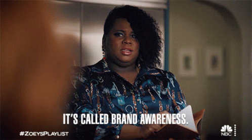 A Woman Says It 'S Called Brand Awareness While Holding A Clipboard GIF