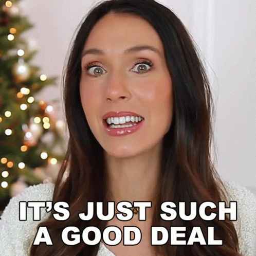 A Woman Says It 'S Just Such A Good Deal With A Christmas Tree In The Background GIF