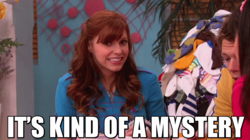 A Woman Says It 'S Kind Of A Mystery While Holding A Pile Of Socks GIF