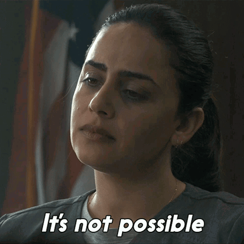 A Woman Says " It 'S Not Possible " While Looking At Something GIF