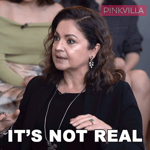 A Woman Says It 'S Not Real In Front Of A Pinkvilla Sign GIF