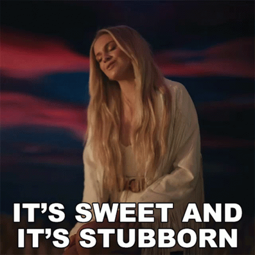 A Woman Says It 'S Sweet And It 'S Stubborn In Front Of A Cloudy Sky GIF