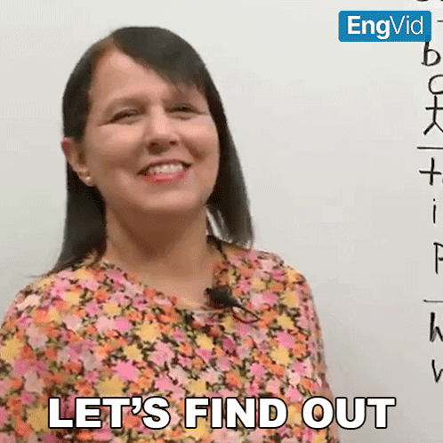 A Woman Says Let 'S Find Out While Standing In Front Of A White Board GIF