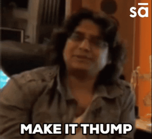A Woman Says " Make It Thump " In Front Of A Computer GIF