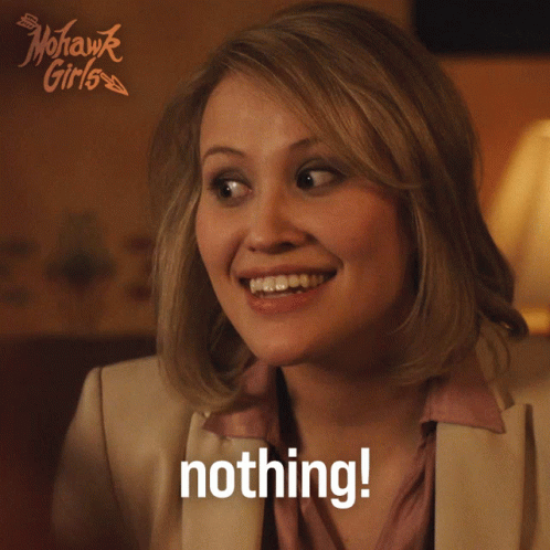 A Woman Says Nothing In Front Of A Mohawk Girls Sign GIF