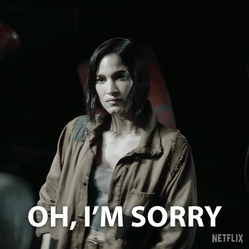 A Woman Says Oh I 'M Sorry In A Black And White Photo GIF