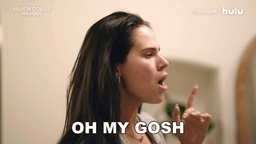 a woman says oh my gosh with her finger