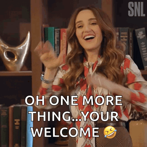 A Woman Says Oh One More Thing Your Welcome In Front Of A Bookcase GIF