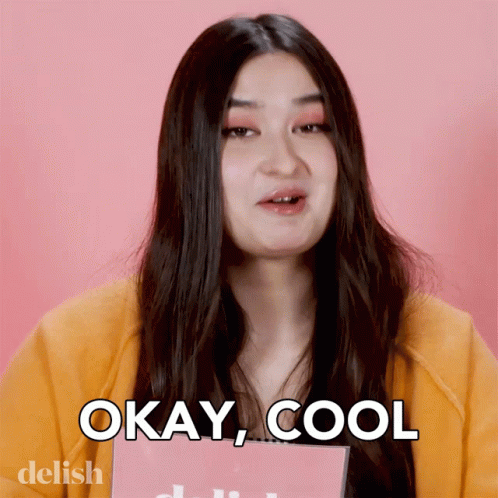 A Woman Says " Okay Cool " While Holding A Book GIF